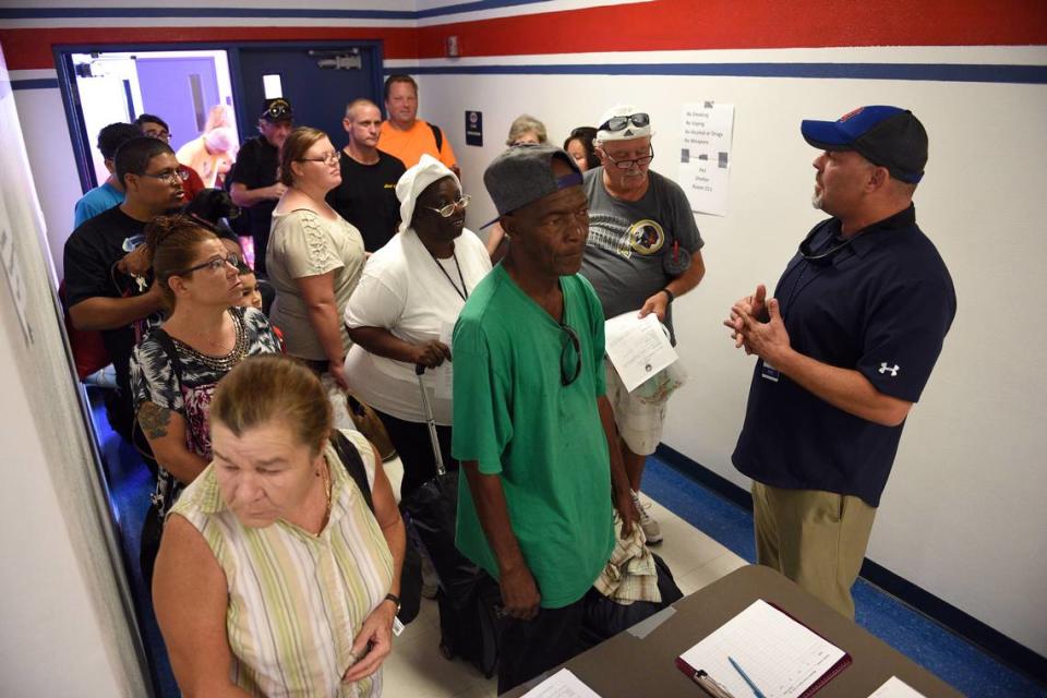 Evacuees waited to register for the shelter at Manatee High School as Hurricane Irma approached. Hurricane shelters should be a last resort as the COVID-19 pandemic is changing the way residents should prepare for hurricanes.