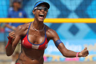 PUERTO VALLARTA, MEXICO - OCTOBER 21: Yarleen Santiago of Puerto Rico celebrates the Bronze Medal win against the USA at the Beach Volleyball Stadium on October 21, 2011 in Guadalajara, Mexico. (Photo by Al Bello/Getty Images)