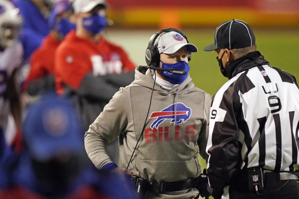 Buffalo Bills head coach Sean McDermott talks with line judge Mark Perlman, right, during the first half of the AFC championship NFL football game against the Kansas City Chiefs, Sunday, Jan. 24, 2021, in Kansas City, Mo. (AP Photo/Charlie Riedel)