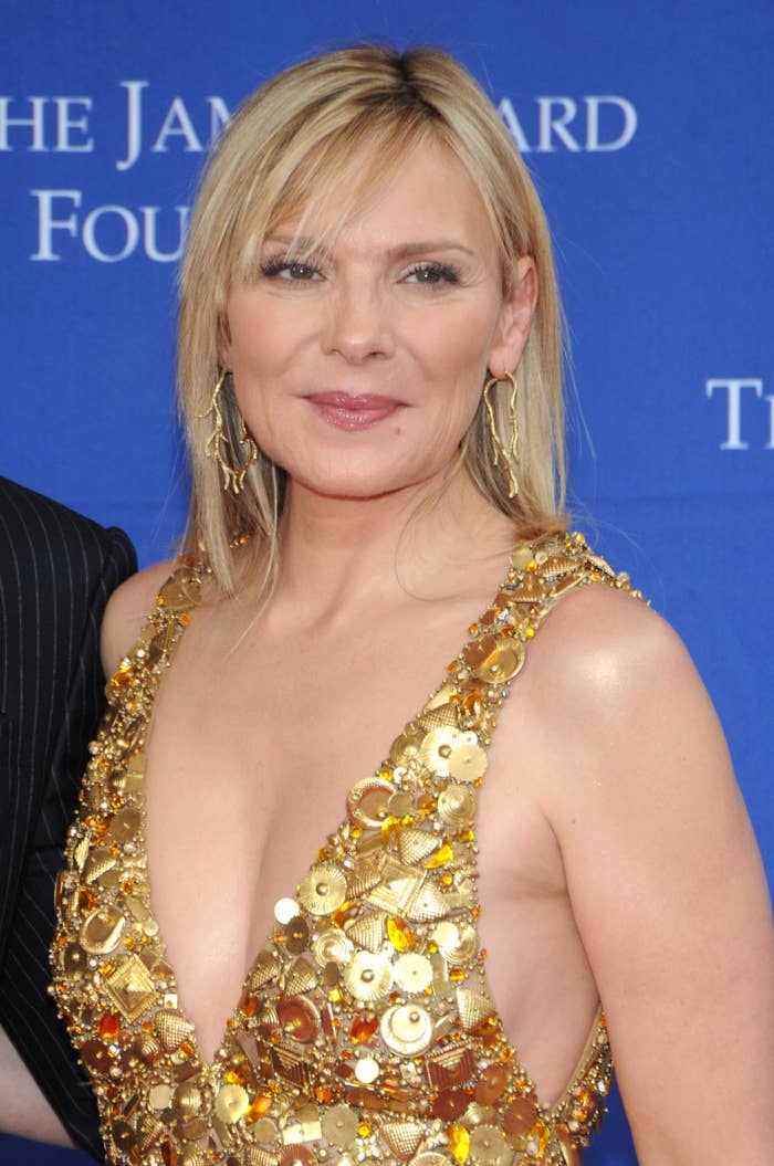 Kim Cattrall on the red carpet in a low-cut embellished dress