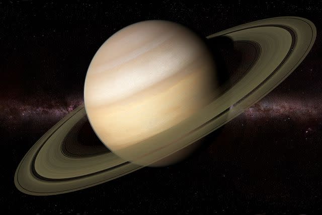 <p>Science Photo Library RF/Getty</p> Saturn.
