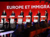 French politicians, from left to right, Arnaud Montebourg, Benoit Hamon, Jean-Luc Bennahmias, Vincent Peillon, Manuel Valls and Sylvia Pinel attend the second televised debate for the French left's presidential primaries in Paris, France, Sunday, Jan. 15, 2016. Seven competitors are bidding to be the Socialist Party's candidate in next spring's French presidential election. (Bertrand Guay/Pool Photo via AP)