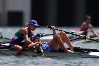 <p>Federica Cesarini and Valentina Rodini of Team Italy are stunned after winning the gold medal during the Lightweight Women's Double Sculls Final A at Sea Forest Waterway on July 29.</p>
