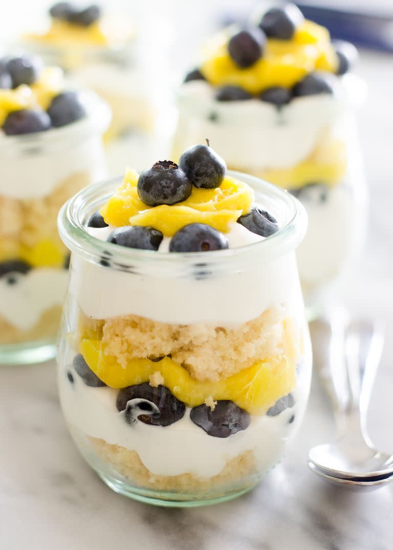 <p>The classic combination of lemon and blueberries is a match made in heaven. It's sweet, tart, and so refreshing. </p><p><a href="https://www.thepioneerwoman.com/food-cooking/recipes/a87601/individual-lemon-blueberry-trifles/" rel="nofollow noopener" target="_blank" data-ylk="slk:Get the recipe." class="link "><strong>Get the recipe.</strong></a></p>