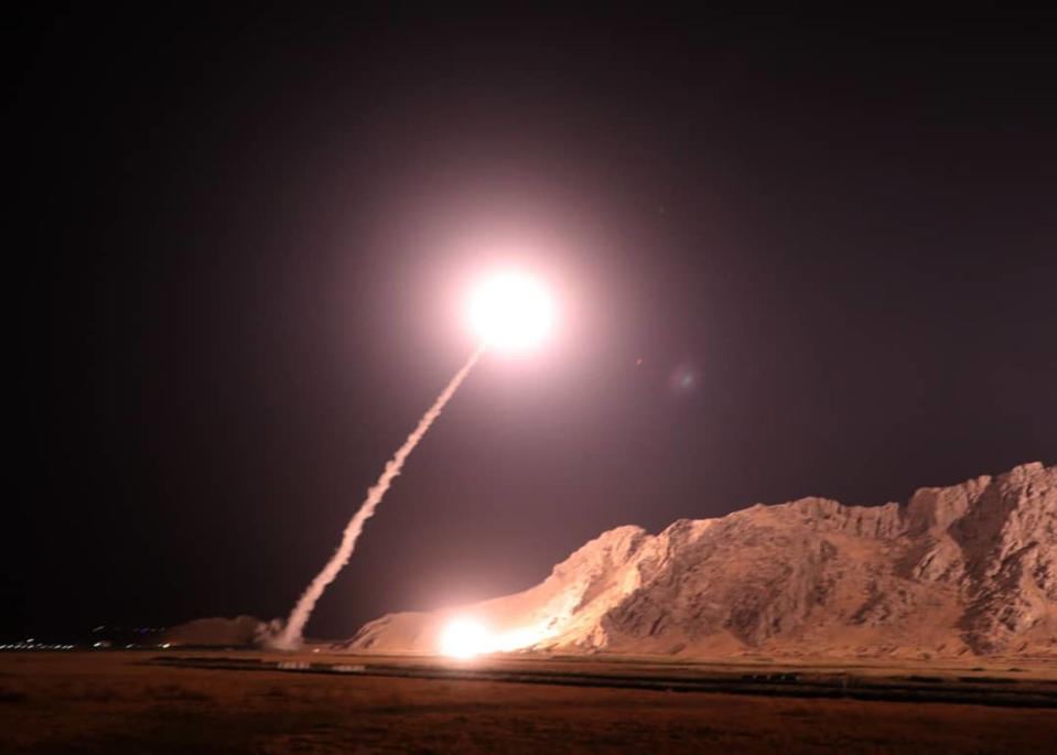 In this photo released on Monday, Oct. 1, 2018, by the Iranian Revolutionary Guard, a missile is fired from city of Kermanshah in western Iran targeting the Islamic State group in Syria. Iran's paramilitary Revolutionary Guard said Monday it launched ballistic missiles into eastern Syria targeting militants it blamed for a recent attack on a military parade. (Sepahnews via AP)