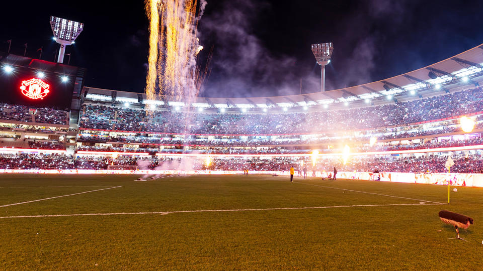 Fans at the MCG, pictured here watching Crystal Palace and Manchester United.