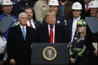 President Donald Trump speaks during an event at the White House to sign a new North American trade agreement with Canada and Mexico, Wednesday, Jan. 29, 2020, in Washington. Vice President Mike Pence is left. (AP Photo/Alex Brandon)