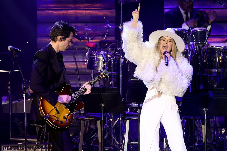 Lainey Wilson, right, seen here performing with Mark Ronson during the Pre-Grammy Gala & Grammy Salute to Industry Icons Honoring Jon Platt on Feb. 3, 2024, at The Beverly Hilton in Los Angeles, will be one of the headliners at this year's Tortuga Music Festival.