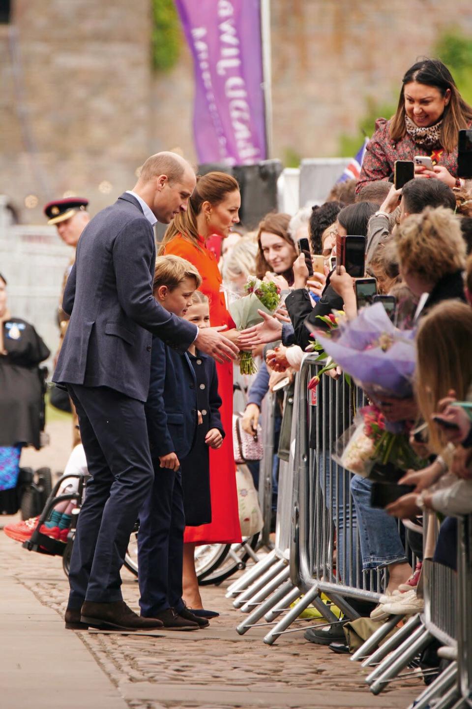The Duke and Duchess of Cambridge, Prince George and Princess Charlotte during their visit to Cardiff Castle to meet performers and crew involved in the special Platinum Jubilee Celebration Concert taking place in the castle grounds later in the afternoon, as members of the Royal Family visit the nations of the UK to celebrate Queen Elizabeth II's Platinum Jubilee. Picture date: Saturday June 4, 2022.
