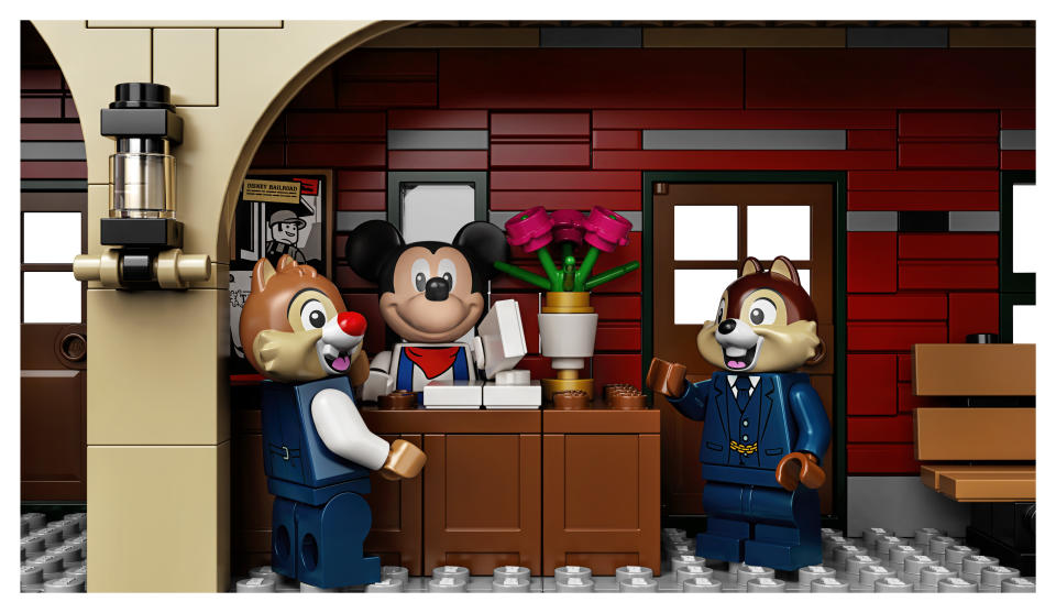Mickey, Chip and Dale mingle at the train station. (Photo: Lego)