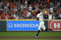 Houston Astros' Carlos Correa (1) celebrates after hitting a three-run home run against the Arizona Diamondbacks during the first inning of a baseball game Sunday, Sept. 19, 2021, in Houston. (AP Photo/David J. Phillip)