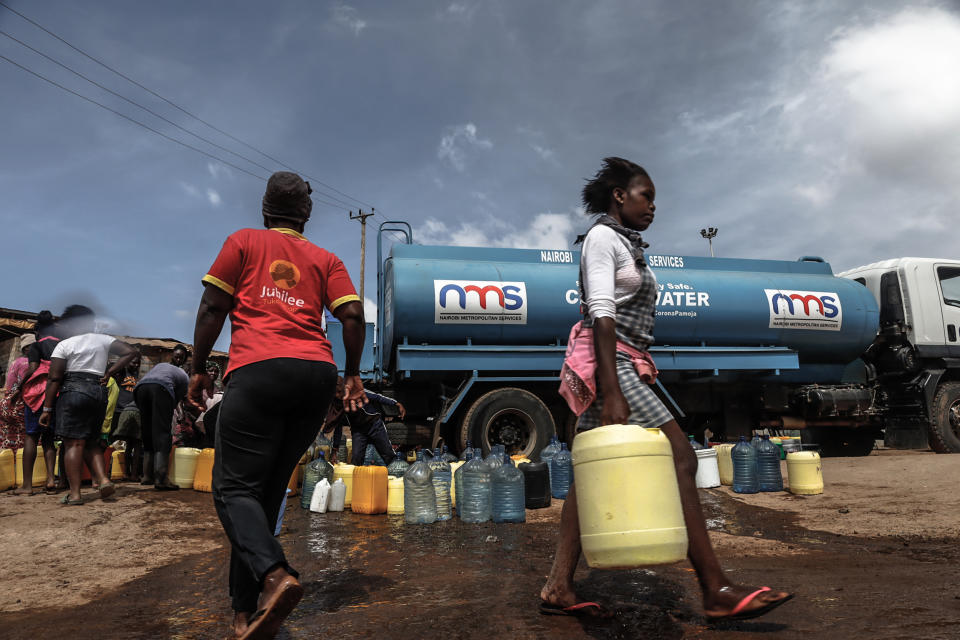 A woman seen carrying her water container filled with water (Donwilson Odhiambo / SOPA Images/LightRocket via Getty Images file )