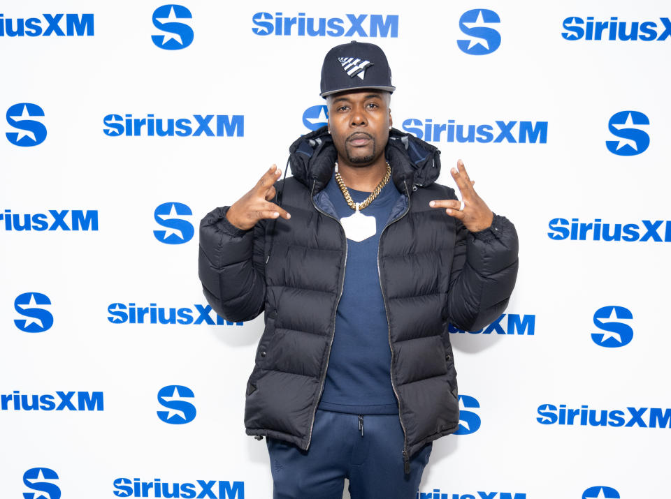 Memphis Bleek Wearing Coat