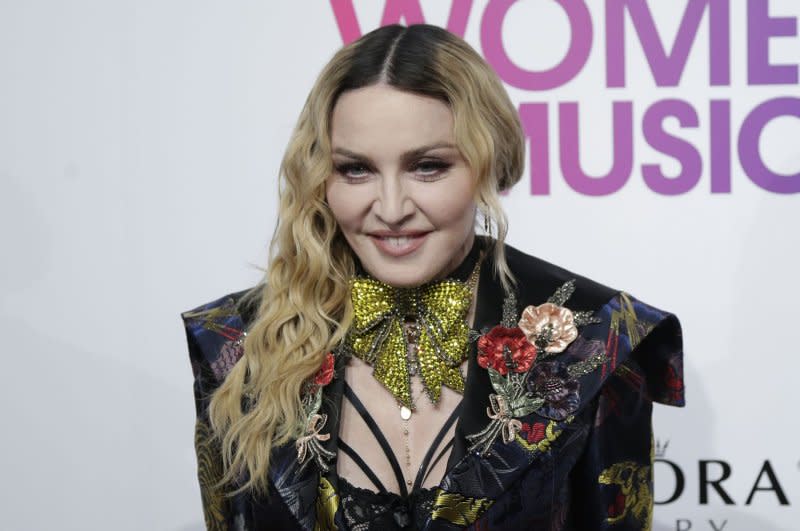 Madonna arrives on the red carpet at the Billboard Women in Music 2016 in New York City. File Photo by John Angelillo/UPI