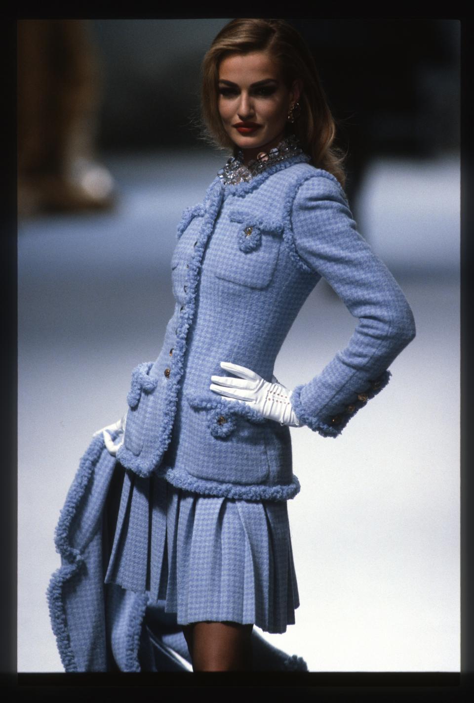 Model Karen Mulder walks the runway during the Chanel fall/winter 1991 couture show in Paris.