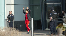 (Rick Egan | The Salt Lake Tribune) Shoppers are evacuated from Fashion Place Mall in Murray, Utah, after a shooting on Sunday, Jan. 13, 2019. (Rick Egan/The Salt Lake Tribune via AP)