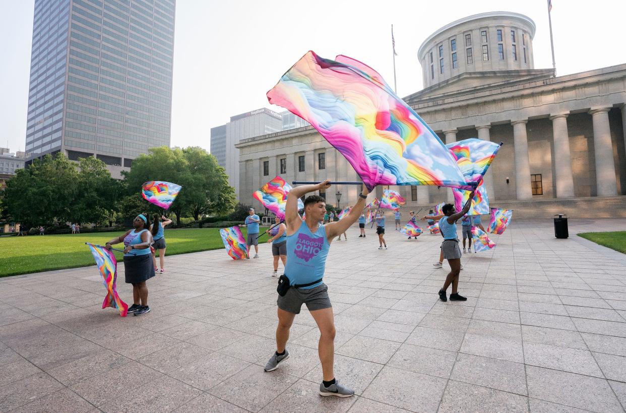 Jun 17, 2023; Columbus, OH, USA;  Brandon Arehart of Dayton performs with the Flaggots Ohio as they warm up in front of the Ohio Statehouse before the Pride March in Downtown Columbus. 