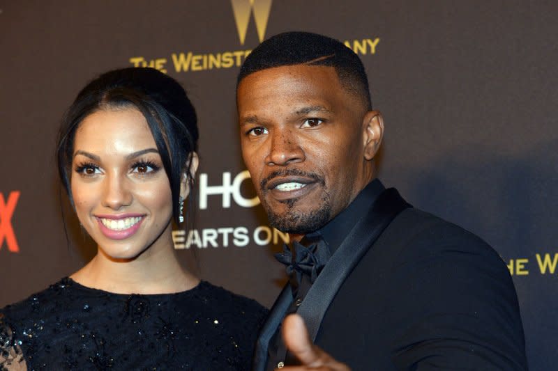 Jamie Foxx (R) and Corinne Foxx attend The Weinstein Co. and Netflix Golden Globes after-party in 2016. File Photo by Christine Chew/UPI