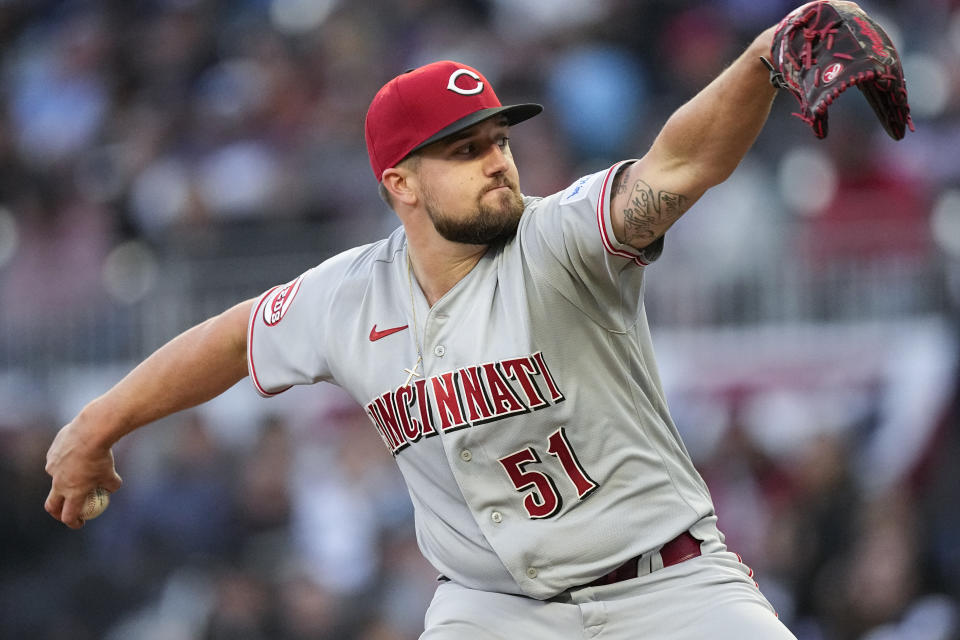 Cincinnati Reds starting pitcher Graham Ashcraft (51) delivers in the first inning of a baseball game against the Atlanta Braves, Monday, April 10, 2023, in Atlanta. (AP Photo/John Bazemore)