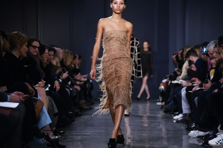A model presents a creation by Jason Wu, during the Fall 2016 New York Fashion Week on February 12, 2016