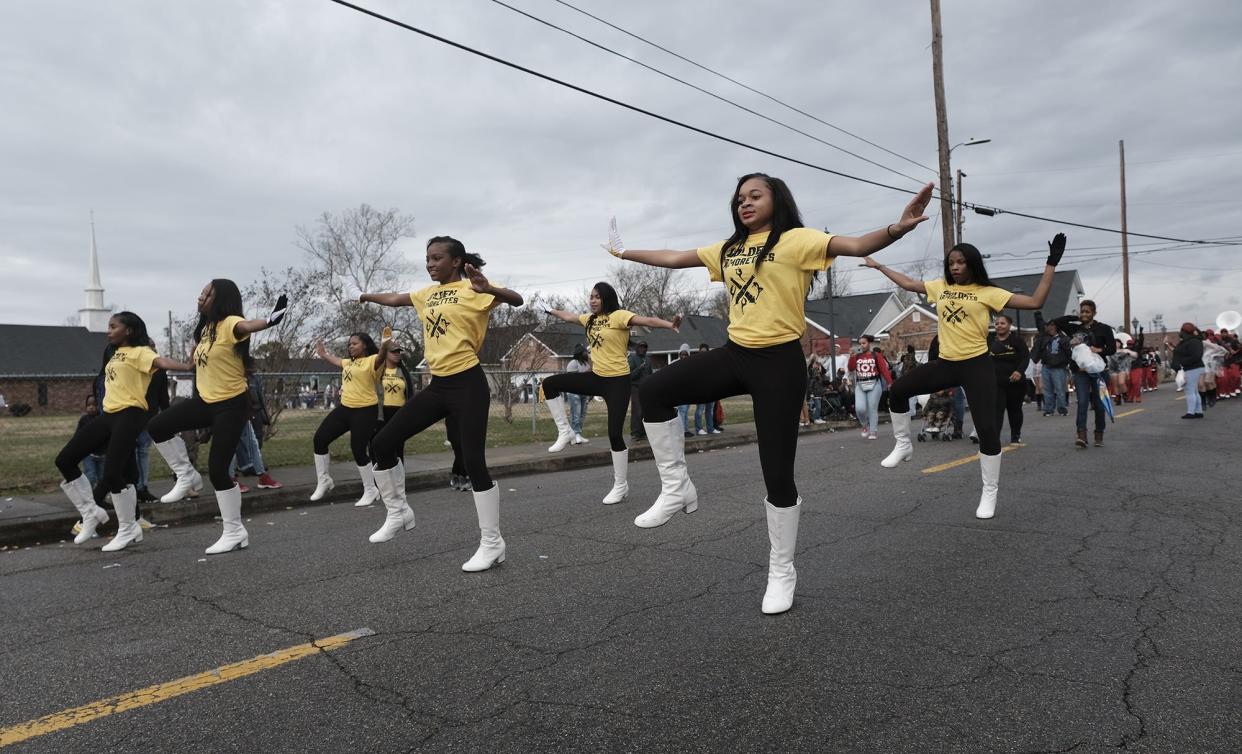 Members of the Golden Armorettes perform a dance routine along the parade route at the MLK Parade in Augusta, in this photo from 2018.
