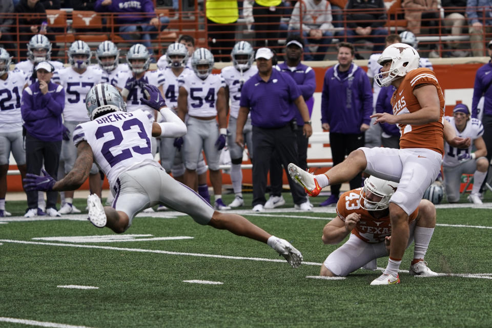 Texas place kicker Cameron Dicker (17) watches his field goal attempt past Kansas State defensive back Julius Brents (23) during the second half of an NCAA college football game in Austin, Texas, Friday, Nov. 26, 2021. (AP Photo/Chuck Burton)
