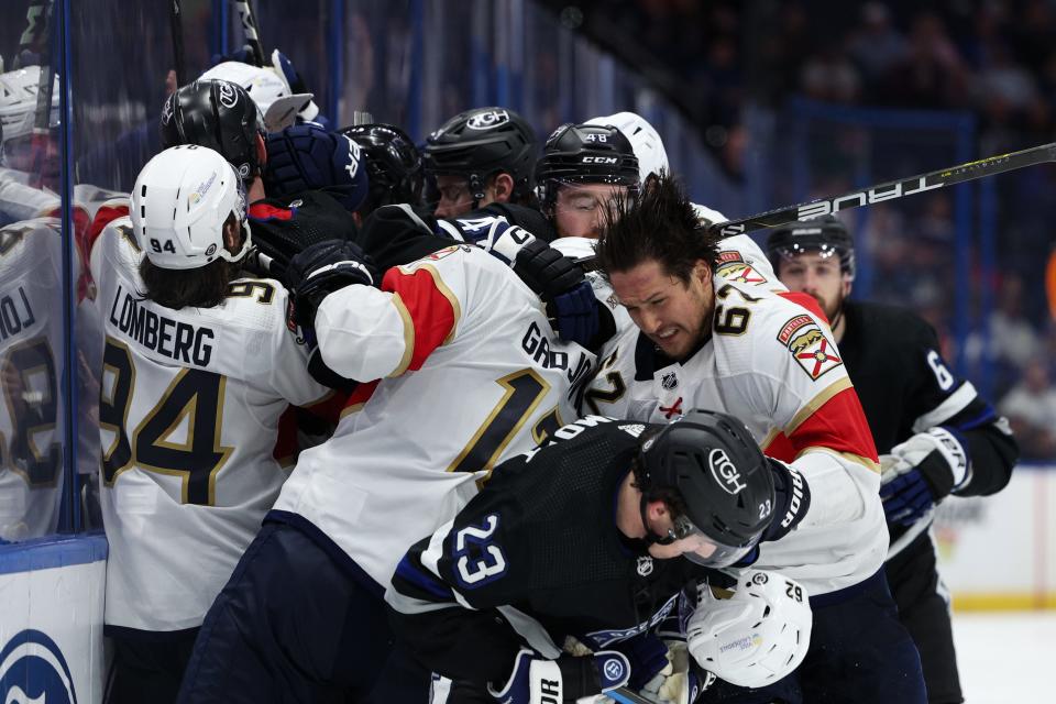 Tampa Bay Lightning and Florida Panthers players scuffle during the third period of their Feb. 17 game.