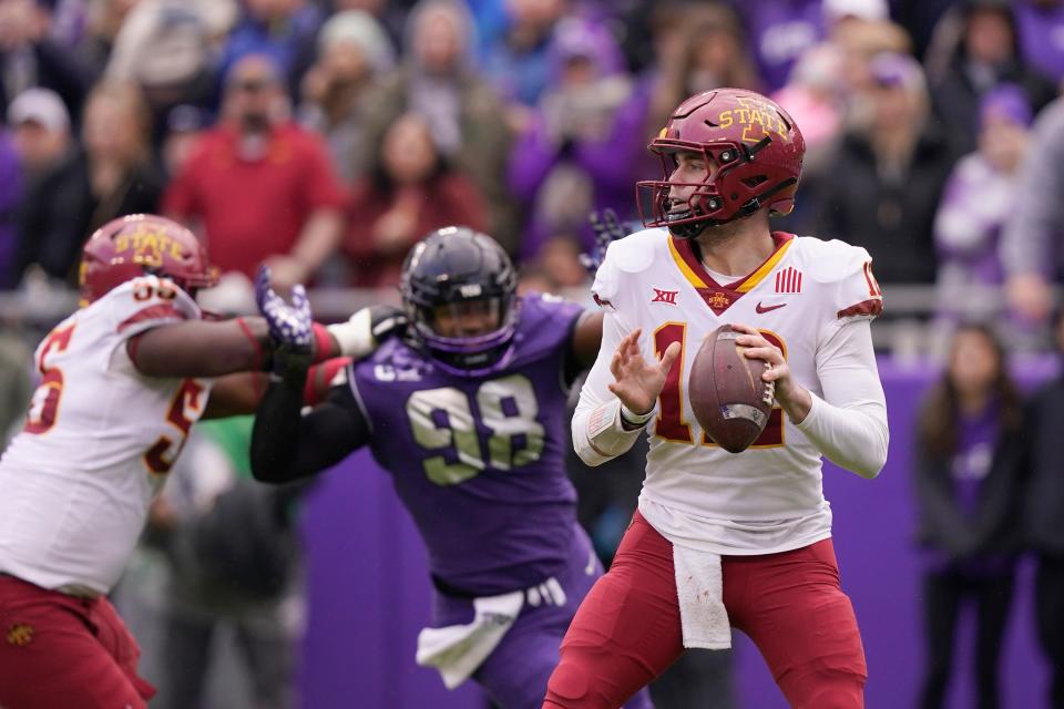 Iowa State quarterback Hunter Dekkers (12) passes as offensive lineman Darrell Simmons Jr. (55) blocks TCU defensive lineman Dylan Horton (98) during the first quarter of an NCAA college football game in Fort Worth, Texas, Saturday, Nov. 26, 2022.