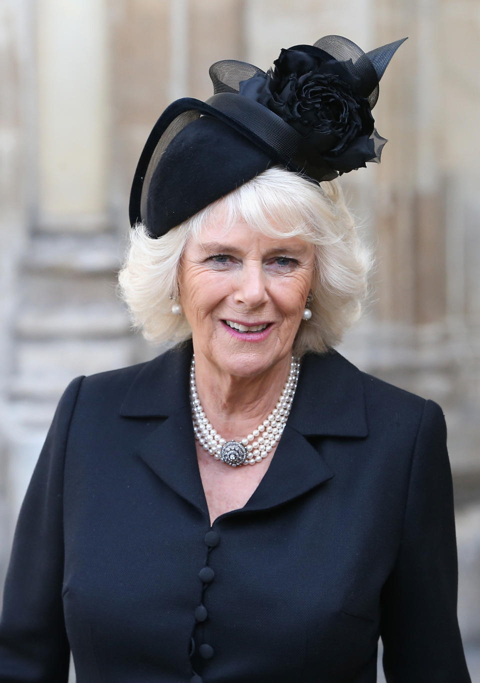 Camilla, Duchess of Cornwall, leaves a memorial service for Sir David Frost at Westminster Abbey on March 13, 2014, in London.