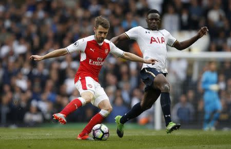 Britain Football Soccer - Tottenham Hotspur v Arsenal - Premier League - White Hart Lane - 30/4/17 Arsenal's Aaron Ramsey in action with Tottenham's Victor Wanyama Action Images via Reuters / Paul Childs Livepic