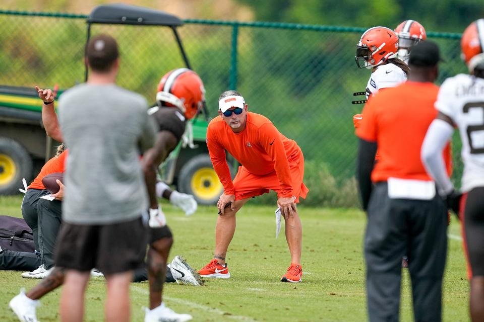 Browns defensive coordinator Jim Schwartz watches drills during training camp, July 29, 2023, in White Sulphur Springs, W.Va.