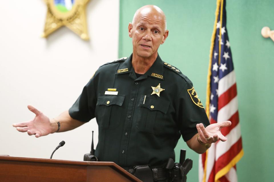 Sheriff Bob Gualtieri speaks to reporters during a news conference at the Pinellas County Sheriff's Office headquarters on Friday, Sept. 23, 2022, in Largo, Michael Hartwick, a Florida sheriff's deputy working an overnight shift to provide safety at a construction zone was struck and killed by a worker operating a front end loader, officials said.(Jefferee Woo/Tampa Bay Times via AP)