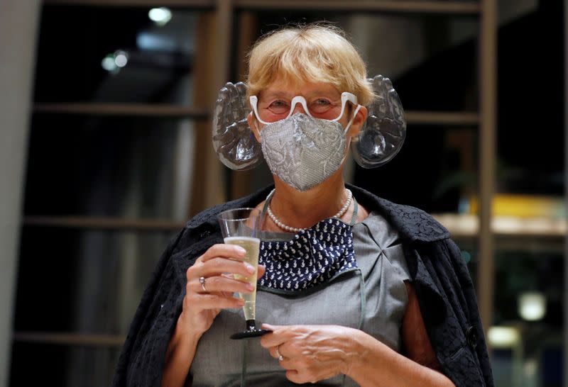 A woman wears Ivan Fischer's acoustic mask at the Mupa Budapest