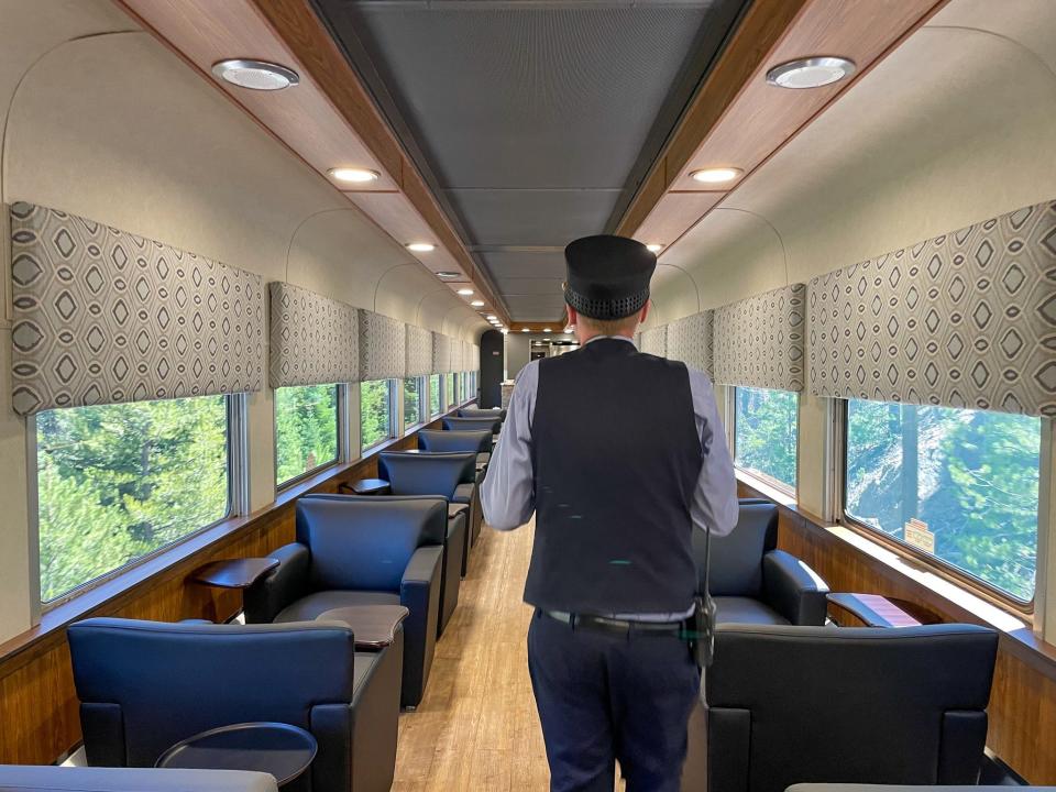 Zach Lucas walks through one of the SIlverleaf Plus lounge cars.