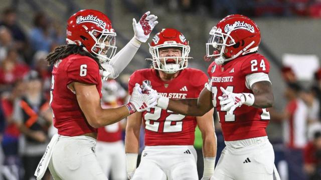 What TV channel is the college football game between Fresno State and  Wyoming on?