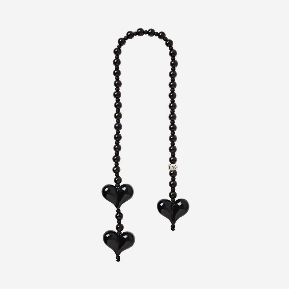 <p><a href="https://go.redirectingat.com?id=74968X1596630&url=https%3A%2F%2Fstringting.com%2Fcollections%2Fbag-charms%2Fproducts%2Fthe-onyx-lasso-ting-bag-charm&sref=https%3A%2F%2Fwww.elle.com%2Ffashion%2Fshopping%2Fg60488199%2Fbag-charms-trend%2F" rel="nofollow noopener" target="_blank" data-ylk="slk:Shop Now;elm:context_link;itc:0;sec:content-canvas" class="link rapid-noclick-resp">Shop Now</a></p><p>Obsidian Lasso Bag Ting</p><p>stringting.com</p><p>$77.00</p>