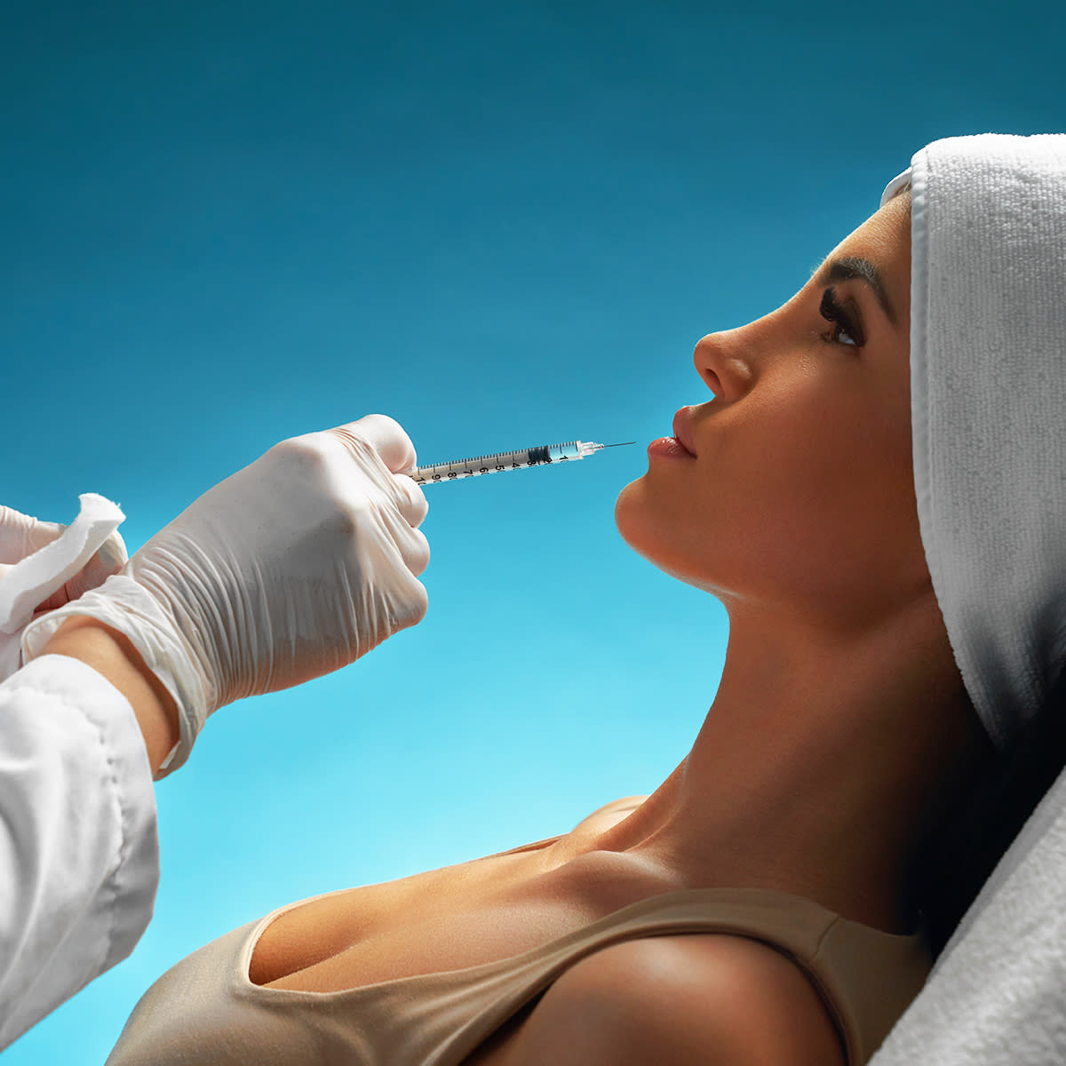  woman getting a filler removed 