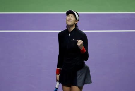 Tennis - WTA Tour Finals - Singapore Indoor Stadium, Singapore - October 22, 2017 Spain's Garbine Muguruza celebrates winning her group stage match against Latvia's Jelena Ostapenko REUTERS/Jeremy Lee