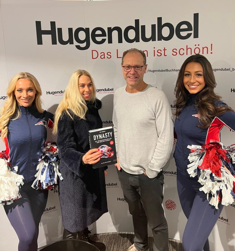 Jeff Benedict, author of the book “The Dynasty,” a look at the New England Patriots, poses with a copy of his book in Frankfurt, Germany, in this undated photo. | Jeff Benedict