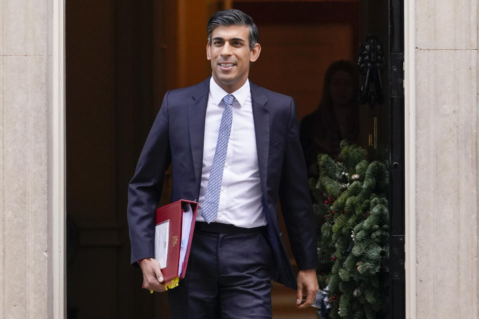 Britain's Prime Minister Rishi Sunak leaves 10 Downing Street as he makes his way to Parliament to attend PMQs, in London, Wednesday, Nov. 30, 2022.(AP Photo/Alberto Pezzali)