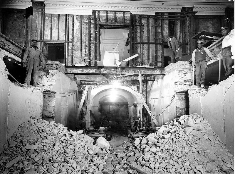 This photograph was taken from the east entrance of the lower corridor of the White House, looking west with the East Room above. The workmen are demolishing the walls of the lower corridor. <a href="http://www.flickr.com/photos/usnationalarchives/page3/" rel="nofollow noopener" target="_blank" data-ylk="slk:(Photo courtesy of the National Archives);elm:context_link;itc:0;sec:content-canvas" class="link ">(Photo courtesy of the National Archives)</a>