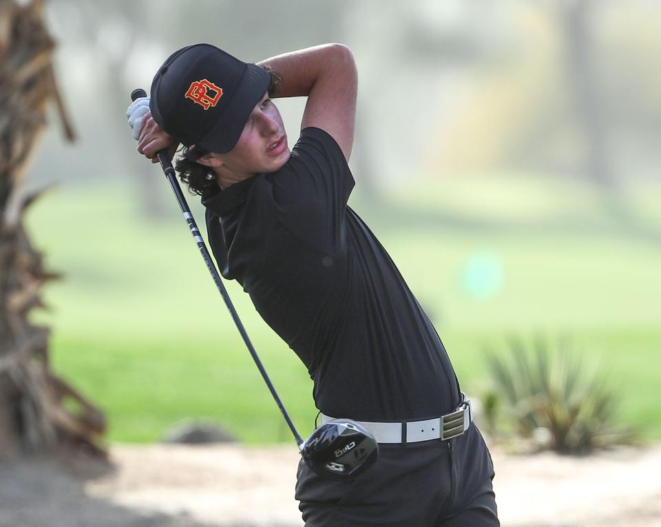 Max Margolis of the Palm Desert High School golf team tees off on the first hole at Desert Willow Golf Resort in Palm Desert, Calif., Feb. 29, 2024.