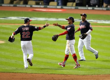 Oct 25, 2016; Cleveland, OH, USA; Cleveland Indians players including Jason Kipnis (22) and Francisco Lindor (12) celebrate after defeating the Chicago Cubs game one of the 2016 World Series at Progressive Field. Mandatory Credit: Charles LeClaire-USA TODAY Sports