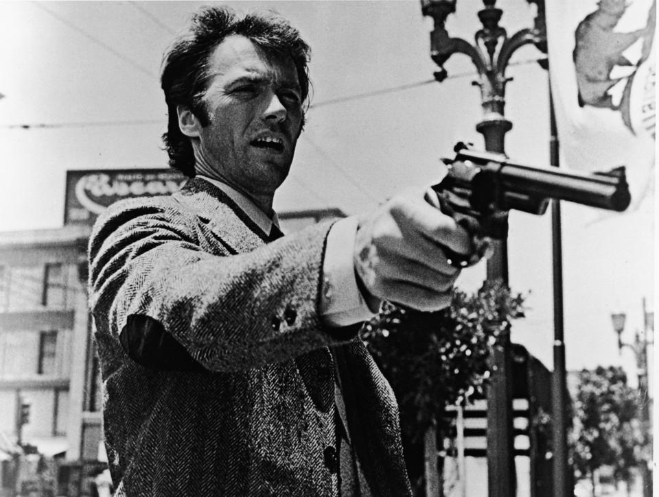 American actor Clint Eastwood&nbsp;points his pistol in a still from the film "Dirty Harry". (Photo: Warner Bros. via Getty Images)