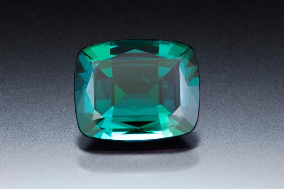 Alexandrite is one of three birthstones for the month of June. Alexandrite comes from a rare variety of minerals that changes color depending on the lighting. This gem can appear green or blue in daylight or fluorescent light. In incandescent light, it can appear red or purple. Alexandrite often represents luck and prosperity.