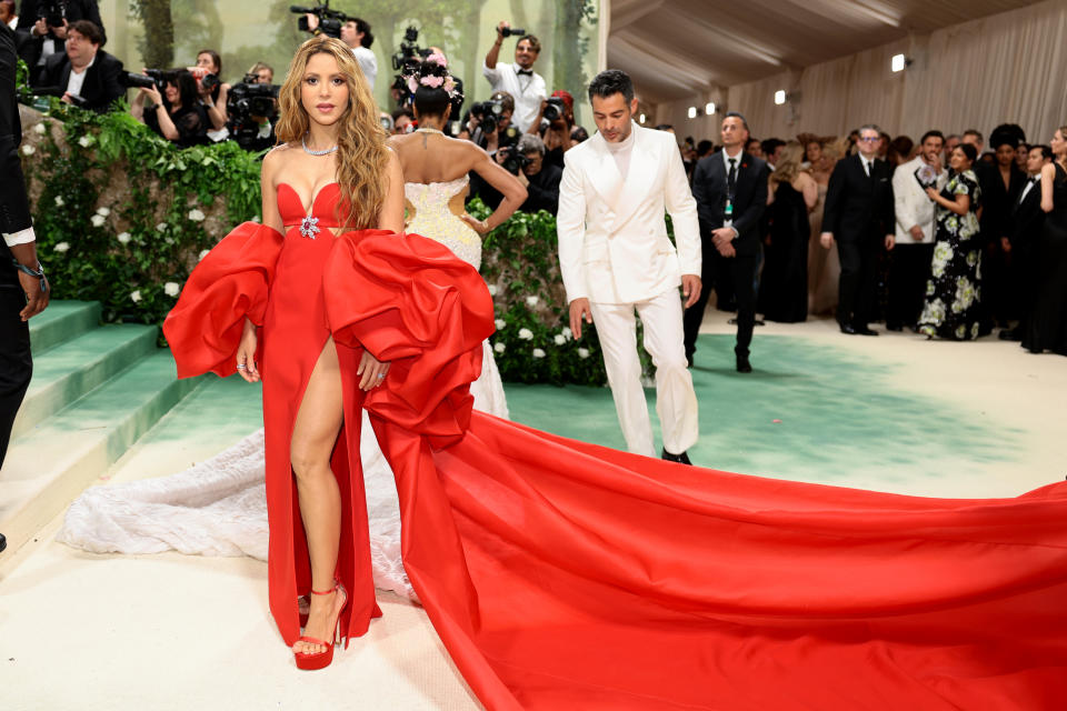 Shakira attends The 2024 Met Gala Celebrating "Sleeping Beauties: Reawakening Fashion" wearing custom-dyed Stuart Weitzman sandals