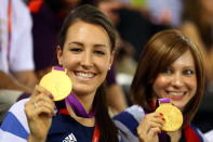 LONDON, ENGLAND - AUGUST 06: Dani King (L) and Joanna Rowsell of Great Britain pose with their medals as they visit to support team-mate Laura Trott of Great Britain compete in the Women's Omnium Track Cycling on Day 10 of the London 2012 Olympic Games at Velodrome on August 6, 2012 in London, England. (Photo by Paul Gilham/Getty Images)