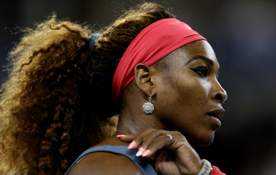 NEW YORK, NY - AUGUST 26:  Serena Williams of the United States of America looks on during her women's singles first round match against Francesca Schiavone of Italy on Day One of the 2013 US Open at USTA Billie Jean King National Tennis Center on August 26, 2013 in the Flushing neighborhood of the Queens borough of New York City.  (Photo by Matthew Stockman/Getty Images)