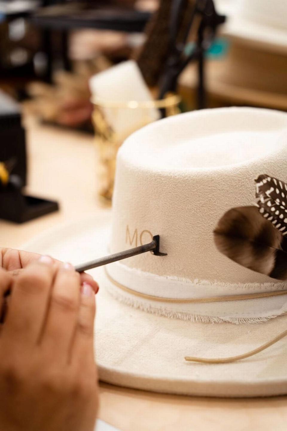 At The Hat Bar in San Luis Obispo, customers can design their own unique hats in a variety of ways, adding jewelry, ribbon and other accessories.