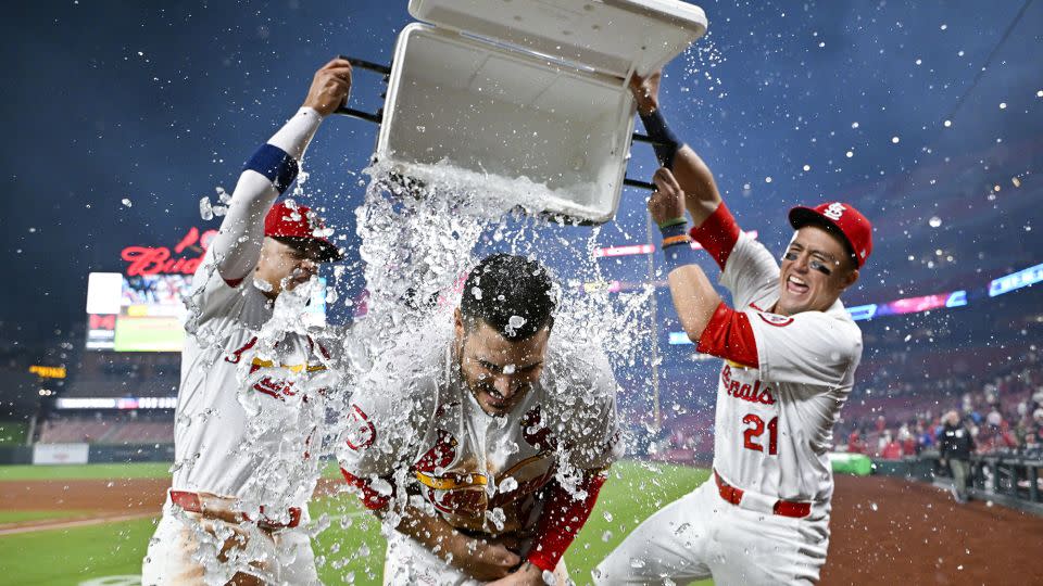 Arenado is doused after hitting a walk-off grand slam against the Milwaukee Brewers. - Jeff Curry/USA TODAY Sports/Reuters